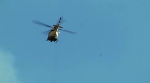 Helicopter flying through sky Stock-Footage 54642209