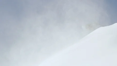 Helicopter flying through the valleys of snowy mountain Stock Footage 116788752