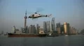 Helicopter in front of Shanghai Skyline, China, Huangpu River, Skyscrapers HD Footage