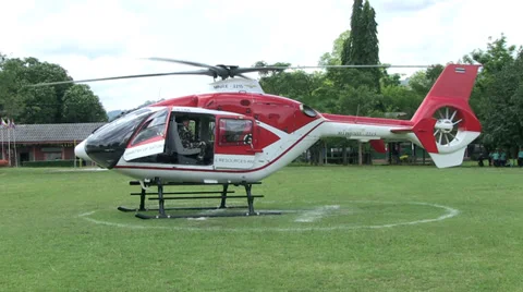 HELICOPTER GROUND STAFF PREPARE TAKE OFF Stock Footage 29153631
