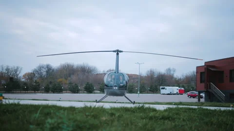Helicopter in hangar, ready to take off Stock Footage 143500859
