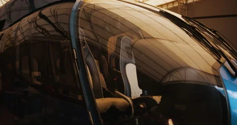 Helicopter in hangar, ready to take off Stock Footage 143500899