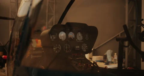 Helicopter in hangar, ready to take off Stock Footage 143501249