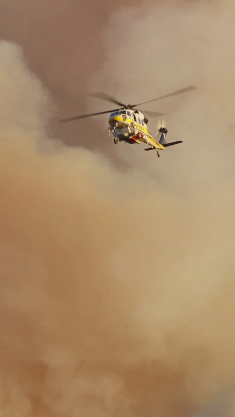 A helicopter has been sent to respond to the fire in Malibu Stock Footage 299677292