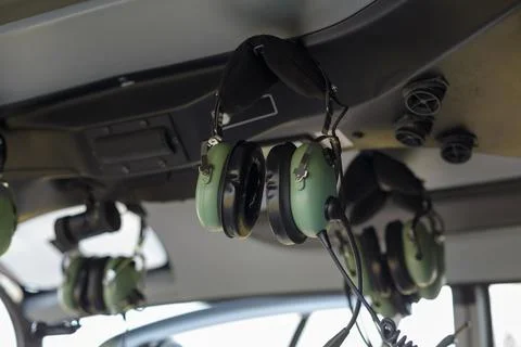 Helicopter headset setup in cockpit area Foto stock