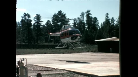 Helicopter Hovering Above Ground Stock Footage 276291463