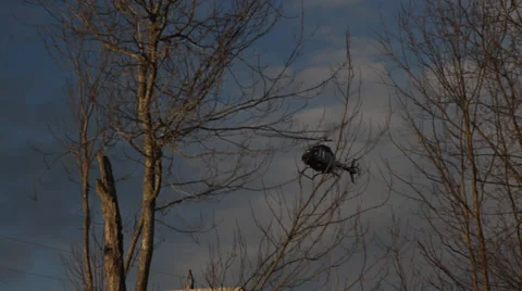 Helicopter Hovering and Flying in Blue Sky Stock Footage 32903446
