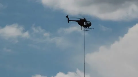 Helicopter hovers over power lines Stock Footage 41455822