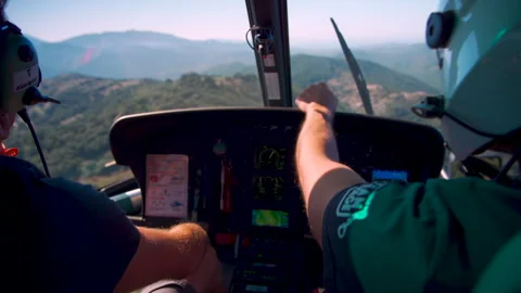 Helicopter Interior Behind Pilot Looking Out - Corsica Stock Footage 255297357