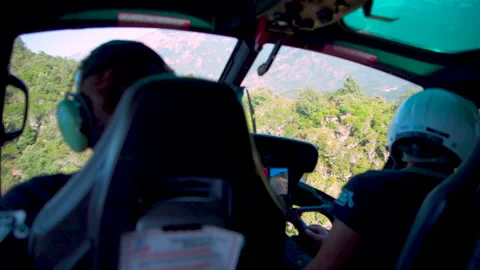 Helicopter Interior Behind Pilot Looking Out - Corsica Stock Footage 255297380