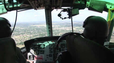 Helicopter interior during flight with 'Caution' light on Stock Footage 41063927