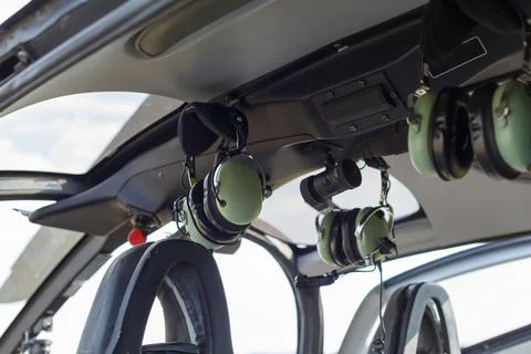 Helicopter interior with headsets Foto stock