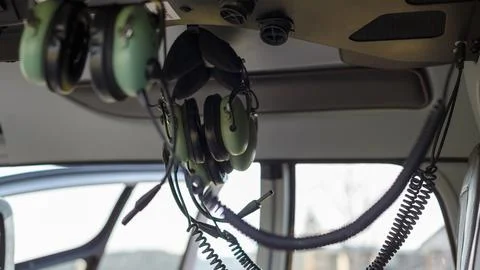 Helicopter interior with headsets Foto stock