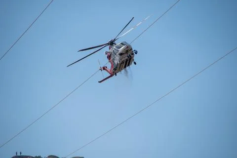A helicopter from the LAFD performs a water drop and observation during a bru Stock-Fotos