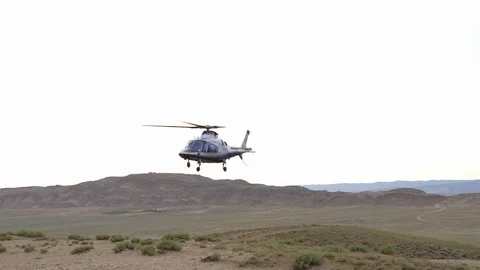 Helicopter landing in the desert Stock Footage 123218238