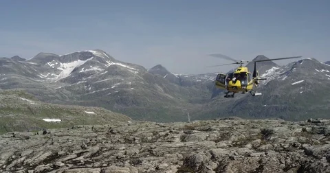 Helicopter Landing On Mountain Top 2 Stock Footage 79989081
