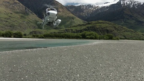 Helicopter Landing on Riverbed Stock Footage 82679238