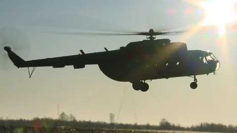 The helicopter lands Stockbeeldmateriaal 120640822