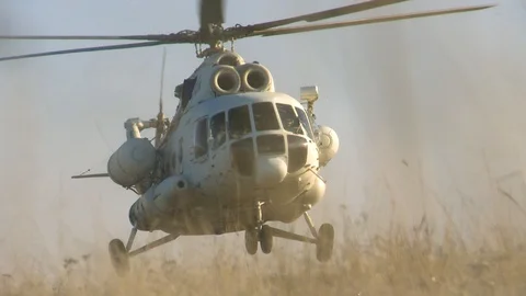 The helicopter lands Stockbeeldmateriaal 120640849