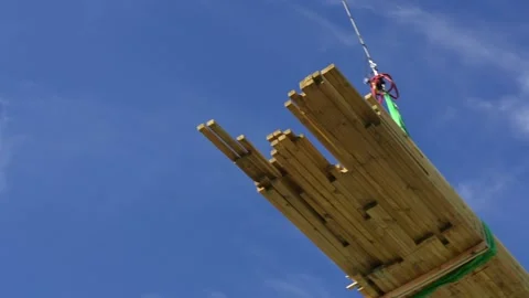 Helicopter lifting payload and flying away with it Stock Footage 209224112