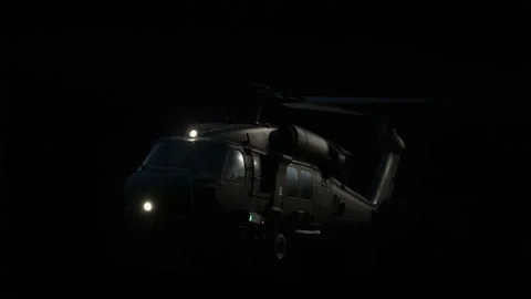 Helicopter with Lights Emerging from Darkness Видео 347248108
