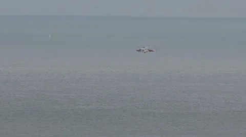 Helicopter Low Over Sea Stock Footage 65281946