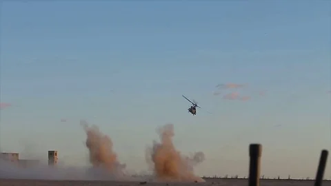 Helicopter makes a maneuver after destroying a target Stock Footage 120844090