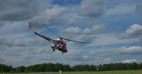 Helicopter MI-2  perform exercises, air slalom Stock Footage 63228306
