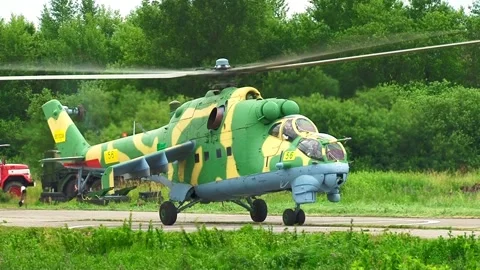 Helicopter Mi-24 / Mi-35 (NATO: Hind) performs vertical take-off. Close-up. Stock Footage 130646090