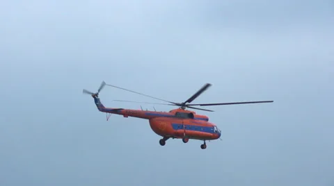 The helicopter Mi-8 which flies in slow motion. Stock Footage 66781652