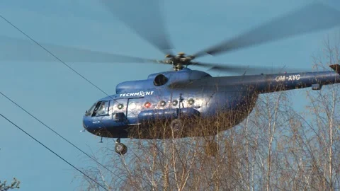Helicopter Operating Near High Voltage Power Lines Stock Footage 341968071