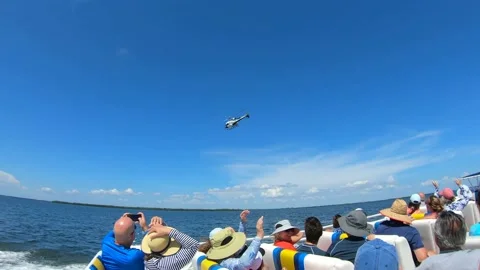 Helicopter over boat Vídeos de archivo 219238254