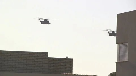 Helicopter over buildings Video stock 76917344