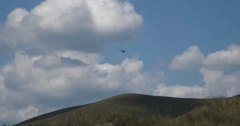 Helicopter over the hills Stock Footage 91402810