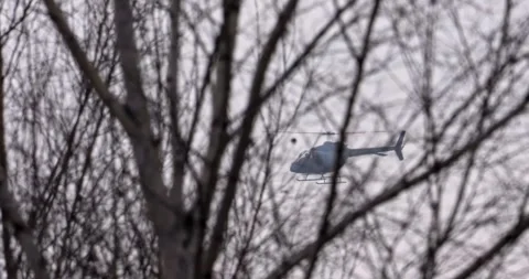 Helicopter over ponds in slow motion. Bytom/Poland-12/08/2024 Stock Footage 295070089