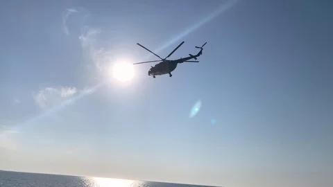 Helicopter over the sea Stock Footage 106221334
