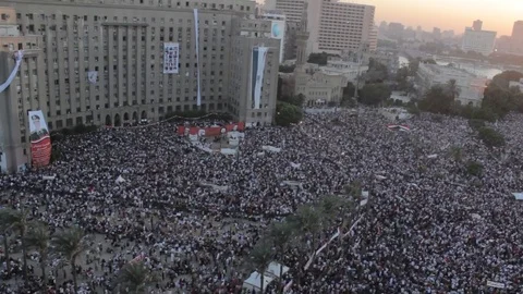 Helicopter over Tahrir square protesters Stock Footage