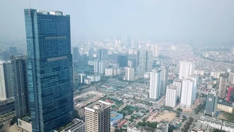 Helicopter overall plan cityscape Modern buildings skyscrapers old Hanoi Vietnam Stock Footage 106745661