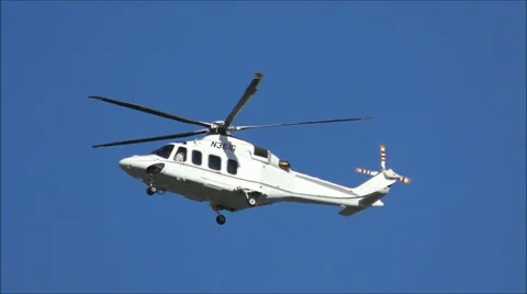Helicopter overhead, blue sky, slow motion Video stock 38833342