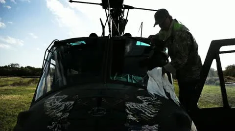 Helicopter Pilot Cleaning Windshield, Color Corrected 스톡 동영상 12532535