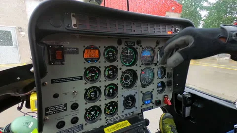 Helicopter Pilot in Flight Cabin Control, Aviation Cockpit Travel Technology Stock Footage 151934214