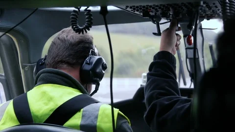 Helicopter pilot view from behind during takeoff v4 Stock Footage 118266361