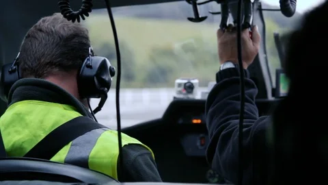 Helicopter pilot view from behind during takeoff v2 Stock Footage 118266438