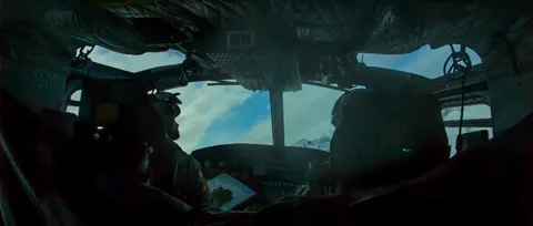 Helicopter Pilots Flying and Navigating Trough Arctic Environment Stockbeeldmateriaal 37528032