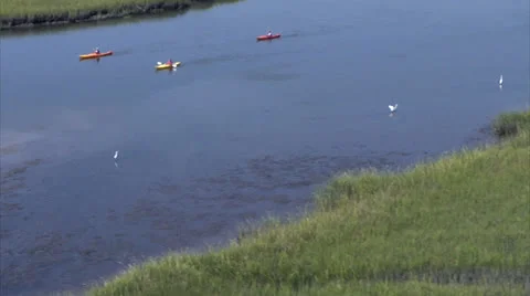 Helicopter POV Fly-Over of Kayakers -alt Stock Footage 24458024