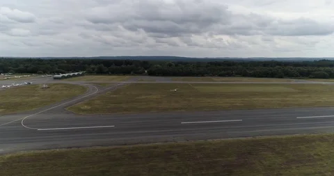 Helicopter practices hovering in a stationary position drone aerial 4k Stock Footage 124647157