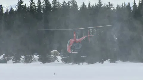 Helicopter R22 Beta Takeoff Hover Snow Video stock 10840993