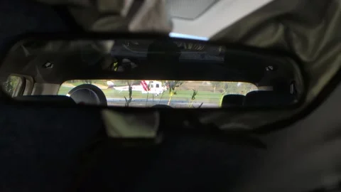 Helicopter Reflected in Car Mirror on a Sunny Day Stock Footage 334932822