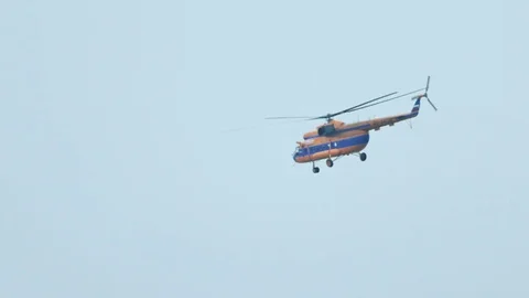 A helicopter returns to the base Stock Footage 72609021