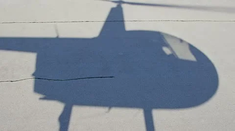 Helicopter shadow Stockbeeldmateriaal 12634223